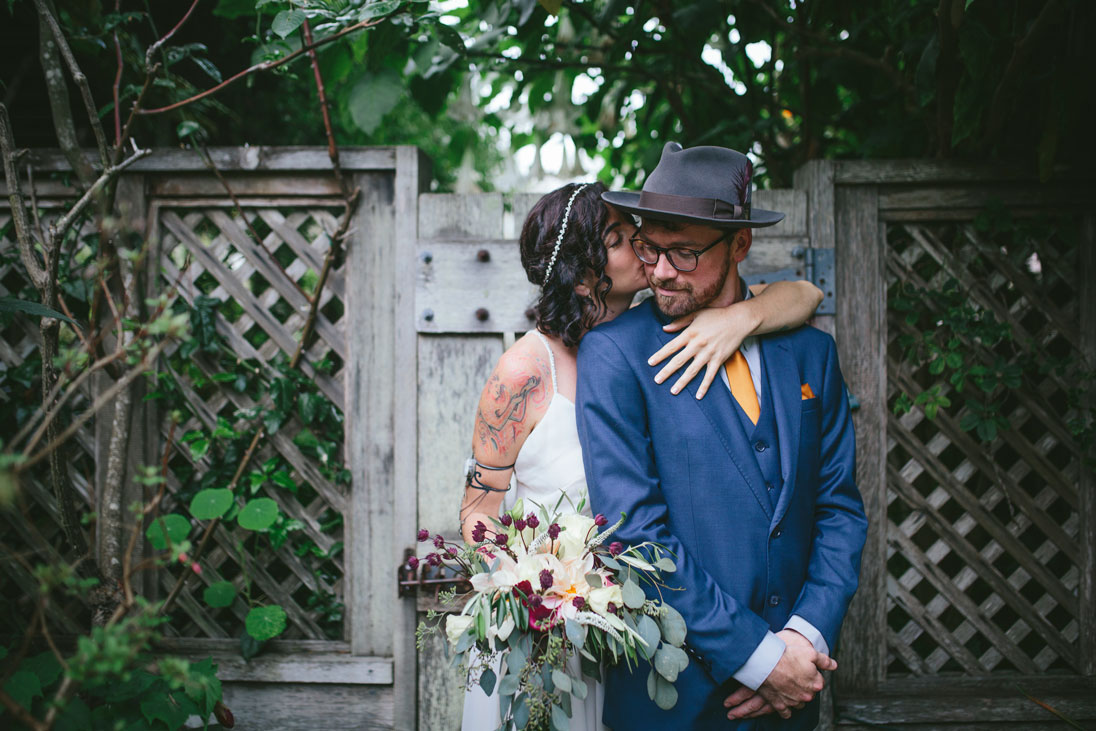 Stinson Beach Wedding Couple in in the garden by Becca Henry Photography