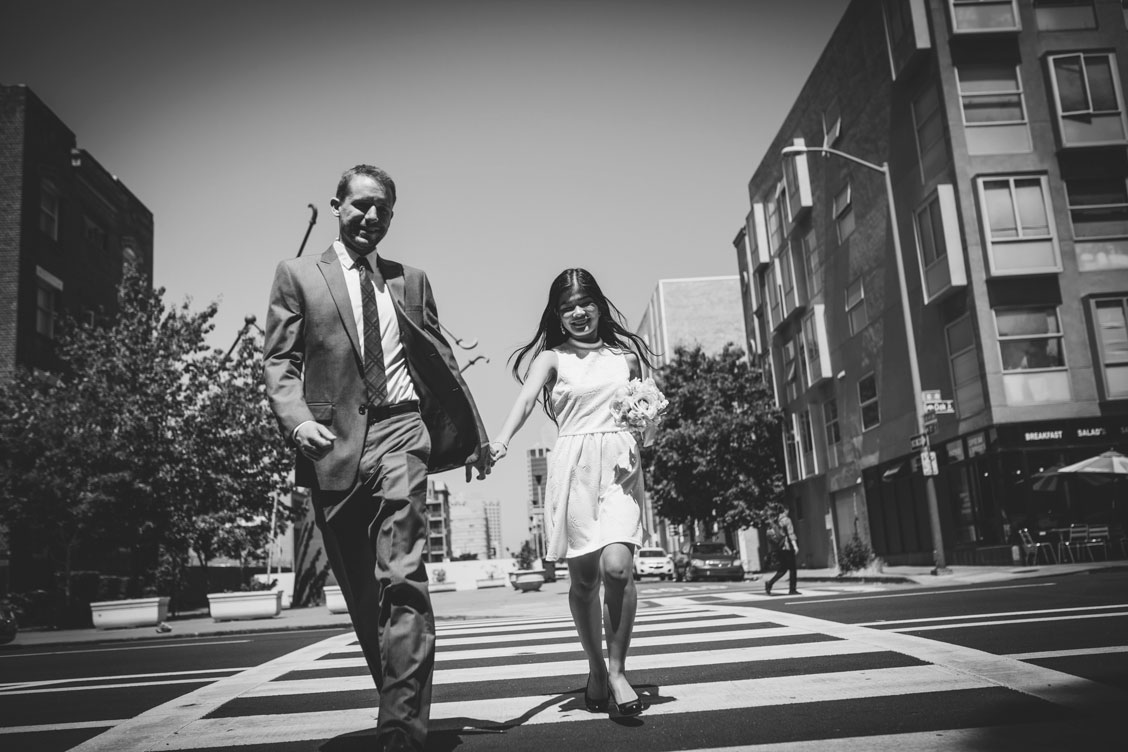 Oakland wedding couple in the crosswalk by Becca Henry Photography