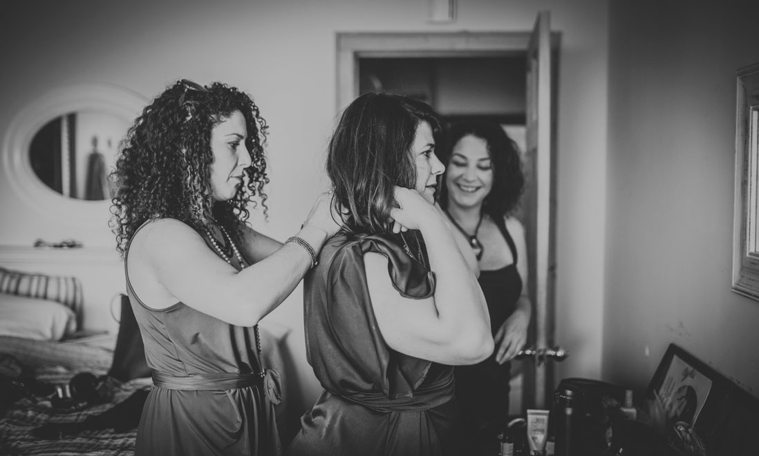 Bridal party champagne cheers by Becca Henry Photography