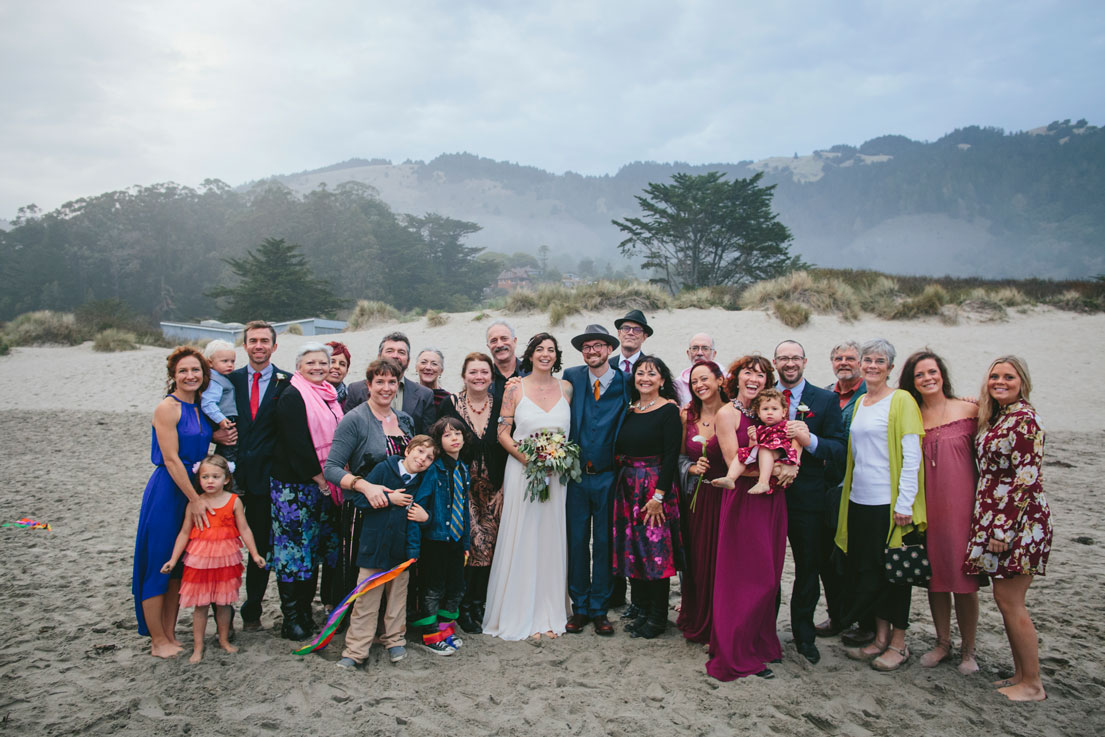 Group family photo on foggy beach at Stinson Beach Wedding by Becca Henry Photography