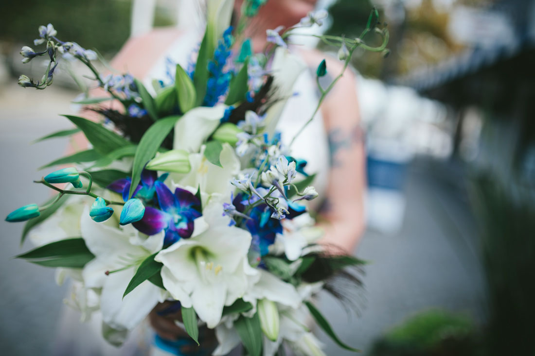 Wedding bouquet of blue and white lilies by Becca Henry Photography