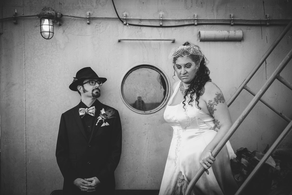 BW, Moody portrait of the bride and groom on the SS Red Oak Victory by Becca Henry Photography