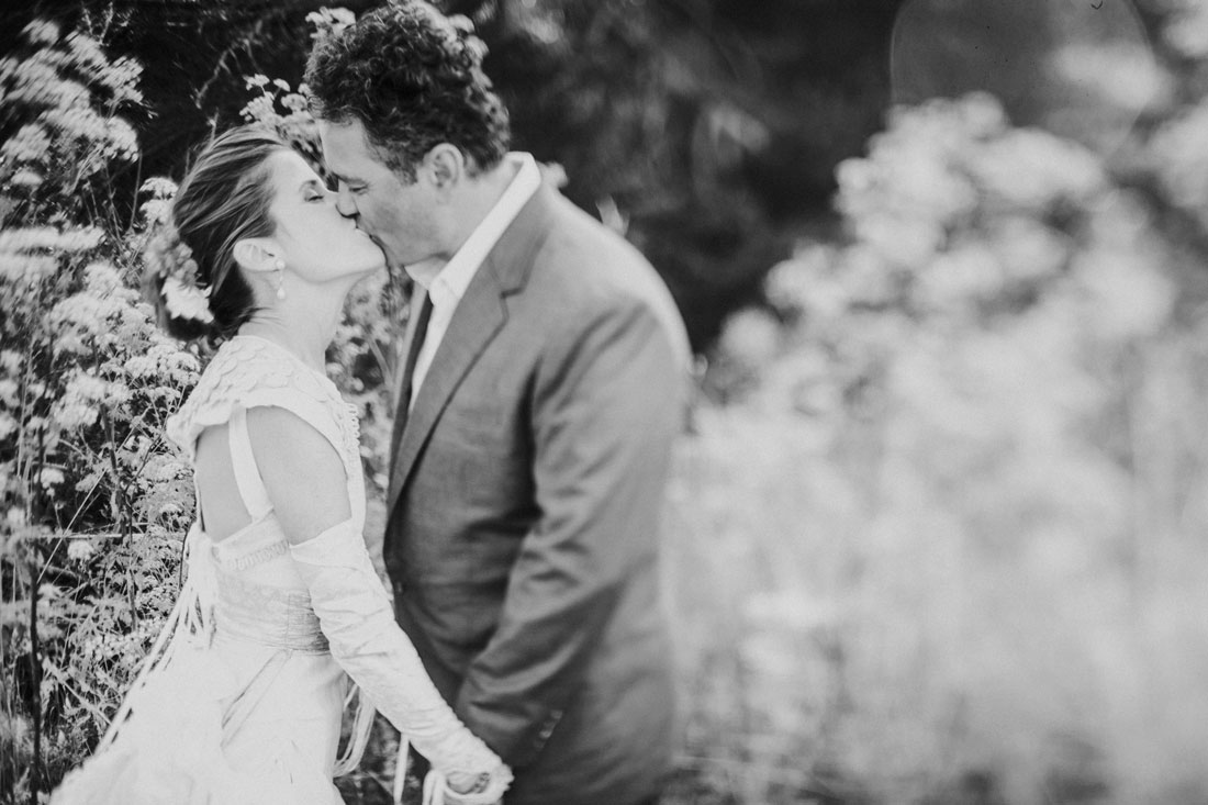 Beautiful Mendocino couple in the garden by Becca Henry Photography