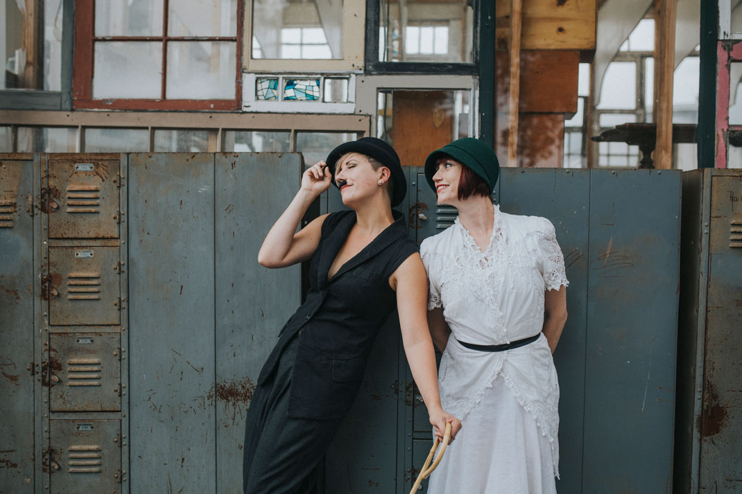 Swoon - Day after wedding session at Ohmega Salvage in Berkeley- dressed as Charlie Chaplin and ingenue in front of vintage lockers by Becca Henry Photography