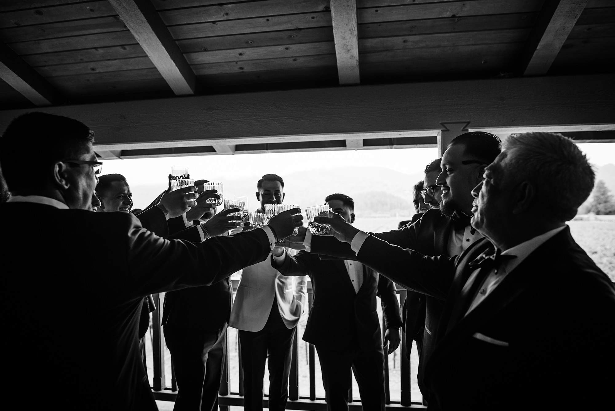 Wedding crew toasting groom at Harvest Inn.