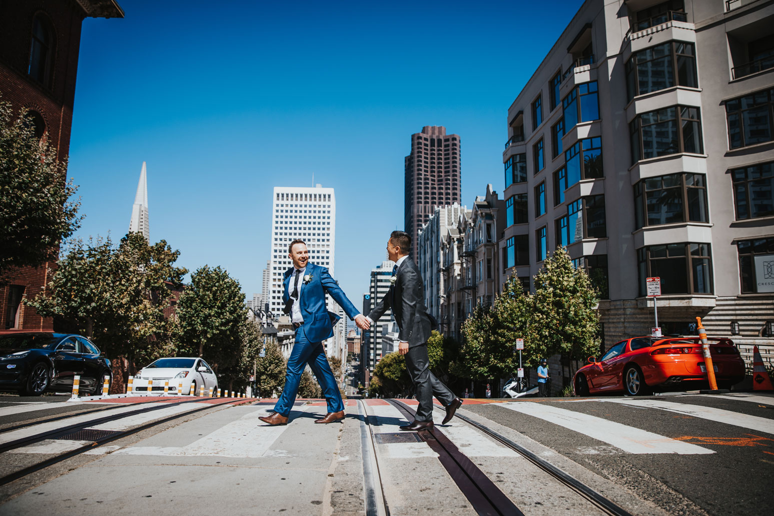 Fun San Francisco Wedding -Grooms walking across the street like Abbey Road Cover