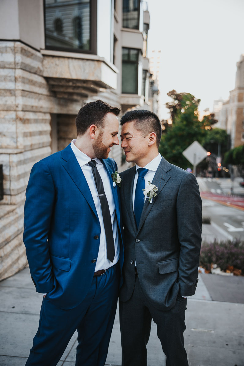 San Francisco same sex wedding - sweet nuzzle of 2 grooms
