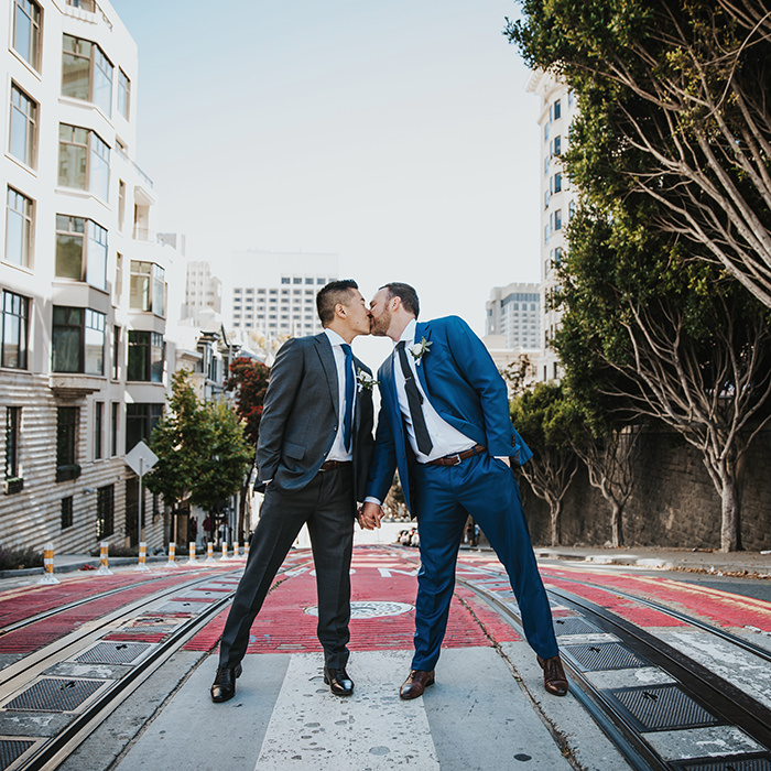Groom and groom kiss at SF City Club Wedding