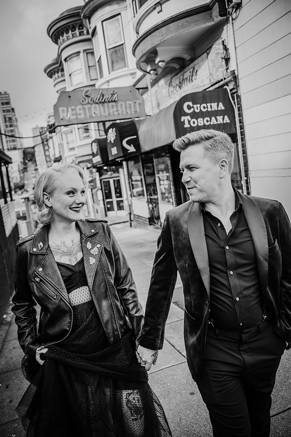 elopement north beach_ BW image of couple holding hands in north beach , san francisco elopement