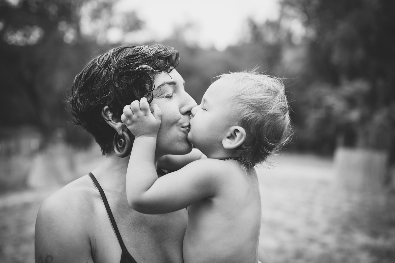 Becca Henry Family Portraits- Baby girl kisses mom